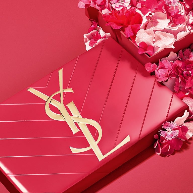 Close-up of a personalized YSL MYSLF Le Parfum
bottle, engraved with 'A.B.', showcasing the art of
luxury gifting.