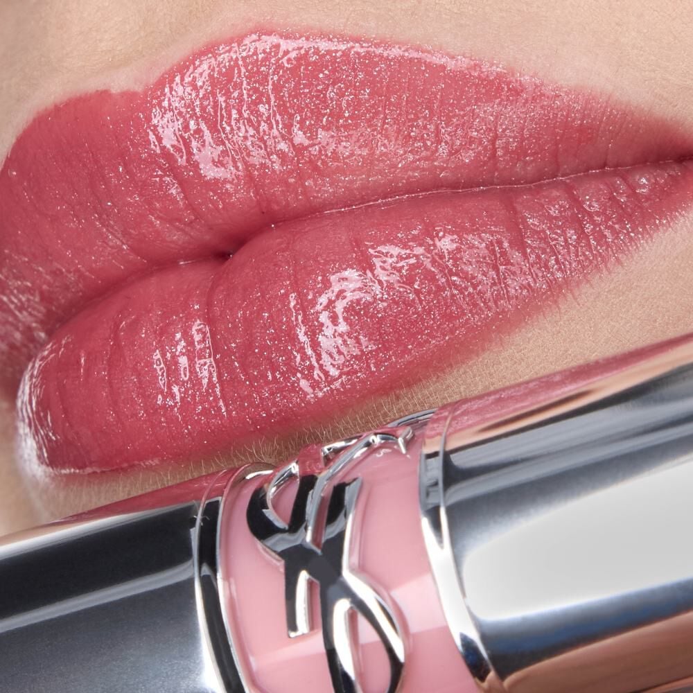 Nessie's lips wearing YSL LOVESHINE Lipstick in shade 215, a
shimmery pink, with the lipstick tube.