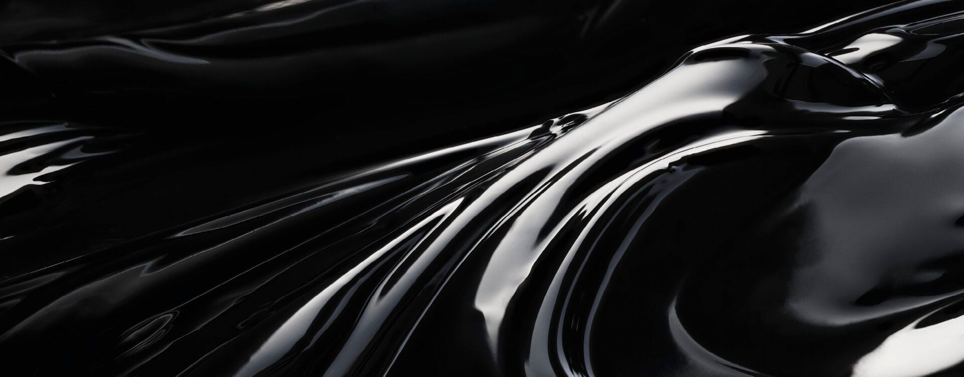 A luxurious, high-gloss black liquid texture, with elegant, fluid waves and reflective highlights, evoking a rich, opulent feel.