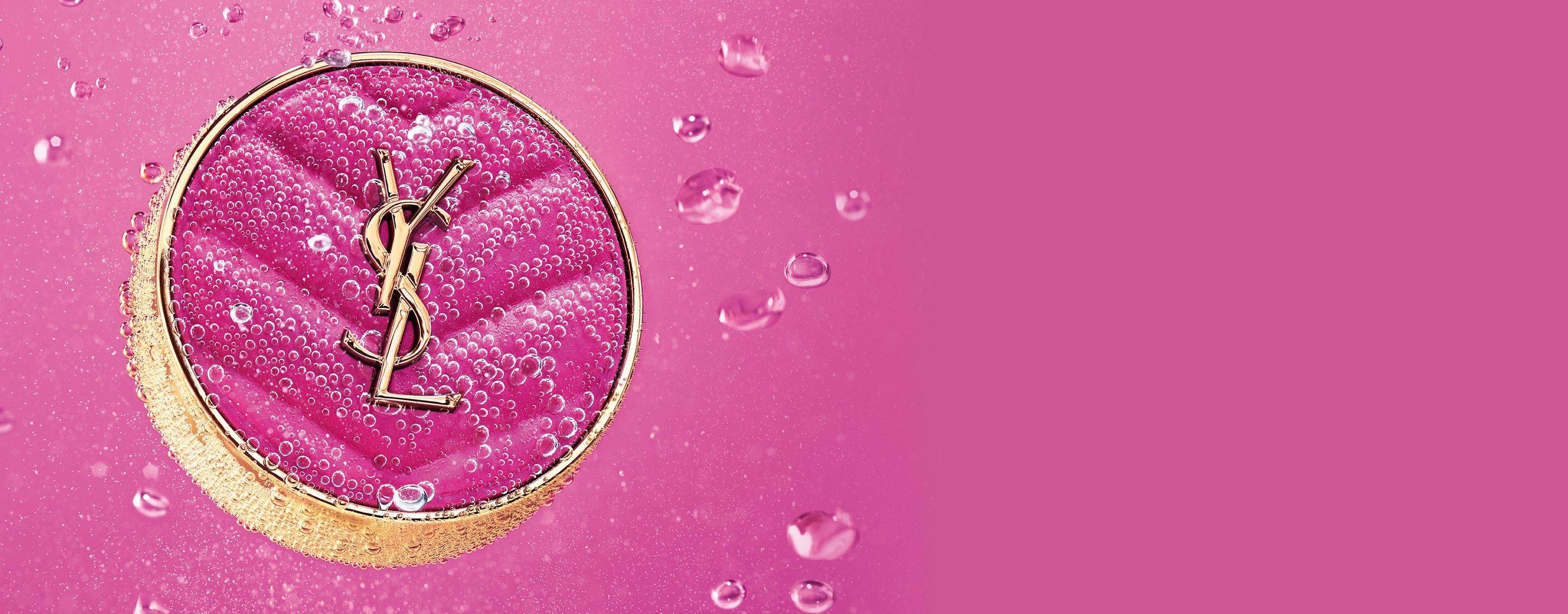 YSL Make Me Blush Powder Blush in shade 66 Fuchsia Fizz, immersed
in water with bubbles on a vibrant pink background.